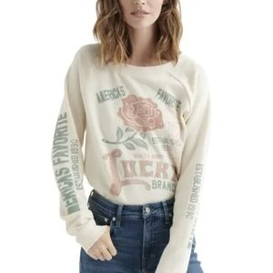 🆕 Lucky Brand Long Sleeve Top with Print in Chest and Sleeves. NWT